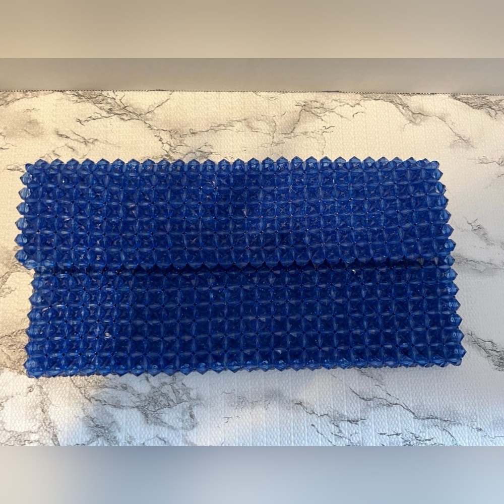 Blue beaded clutch
